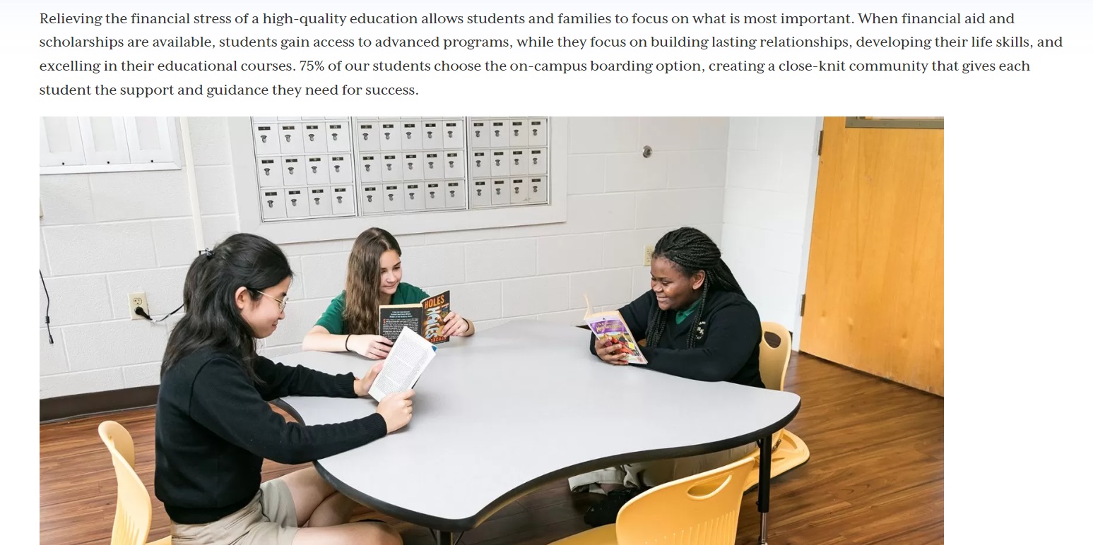 Three students sit around a table.